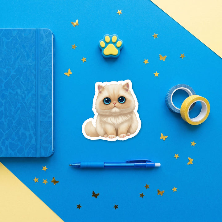 Himalayan Cream Point kawaii 3 inch sticker flat lay with blue and yellow stationery – Designs by Mysh