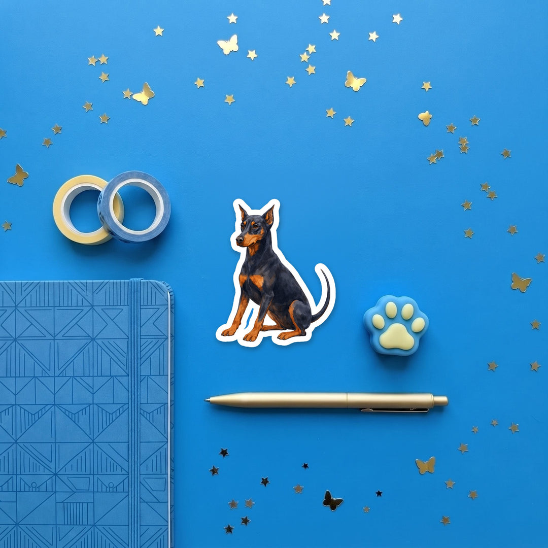 Doberman Pinscher Blue and Rust watercolor 3 inch sticker flat lay with blue and yellow stationery – Designs by Mysh